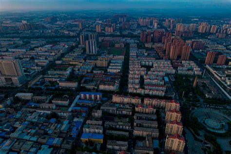 河南许昌城市日出航拍摄影图-包图企业站