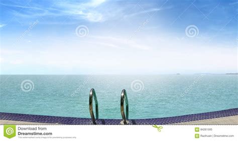 Infinity Swimming Pool Facing Sea at Sunrise Stock Image - Image of ...