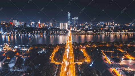 城市夜晚柳州文昌大桥夜景航拍岸边无人机摄影图配图高清摄影大图-千库网