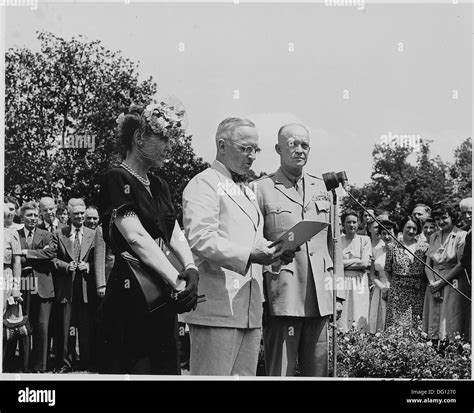 Photograph of President Truman reading the citation for General Dwight ...