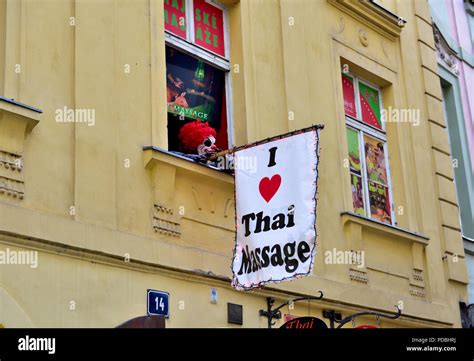 Sign hanging out of window in Prague, Czech Republic, "I love Thai ...