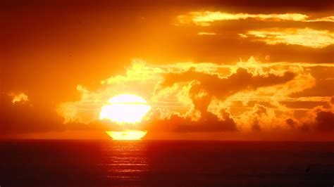 高清晰日落日出夕阳红摄影图