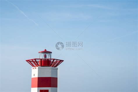 在美好的一天一座红色的灯塔拥高清图片下载-正版图片505910796-摄图网