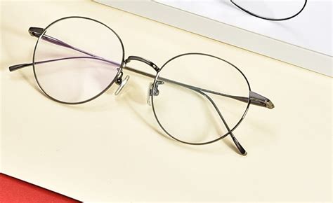 千艾新产品2023复古圆形眼镜框 创意款眼睛女金属近视平光眼镜架-阿里巴巴