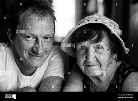 Grandmother grandson hug Black and White Stock Photos & Images - Alamy