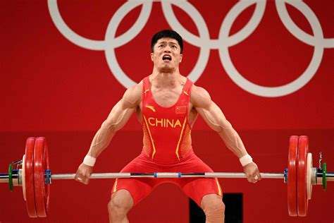 第3金！男子举重56KG级中国选手龙清泉夺冠 - 封面新闻