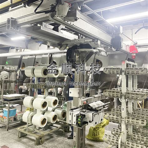 泰玻F09新一代高模高强玻纤池窑拉丝生产线项目案例 - 自动化物流线 自动卸纱机 自动取筒机 - 江苏金顺自动化科技有限公司