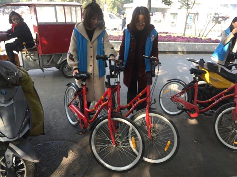 民表系开展“共享单车，共享文明”共享单车摆放整理志愿活动