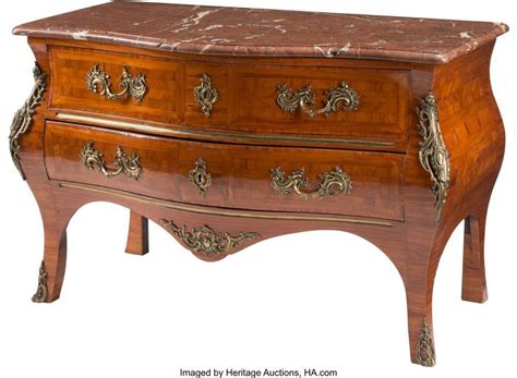 51BidLive-[A French Régence Parquetry Inlaid Chest of Drawers with a ...