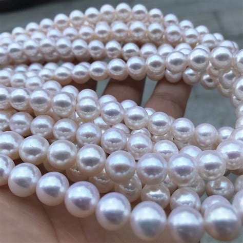 厂家直销淡水珍珠A1AB强光正圆少暇9-10mm珍珠项链批发 柜台礼品-阿里巴巴