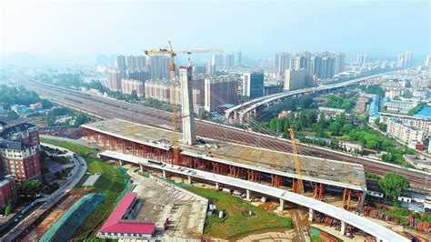 信阳日报-信阳-信阳新五大道下穿铁路立交工程建成通车 非机动车道、人行道等仍在施工