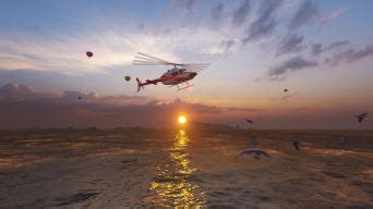 直升机在日落时飞过海面高清摄影大图-千库网