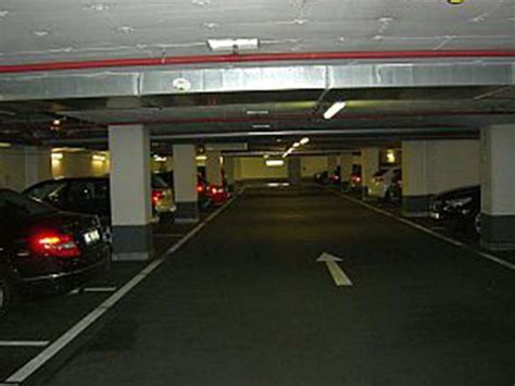 Premium Photo | Parking lot or car park building in urban areas