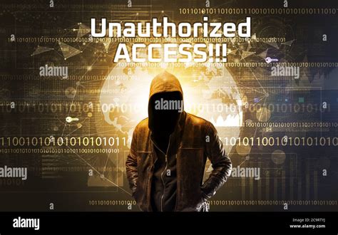 Faceless hacker at work with Unauthorized ACCESS!!! inscription ...
