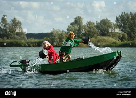 Bailing out boat hi-res stock photography and images - Alamy