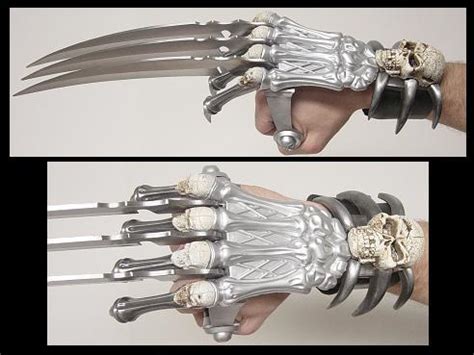 中国古代套在手上，像鹰爪一样，两只手都套着的武器叫什么