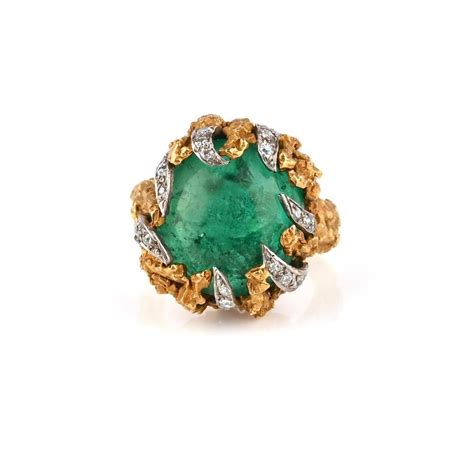 51BidLive-[An emerald and diamond dress ring, 1960s, of abstract design ...