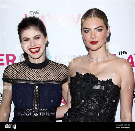 Alexandra Daddario and Kate Upton attending the premiere of The Layover ...