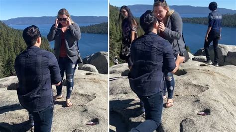 尴尬！美国一对情侣在湖边求婚 被游客闯入镜头破坏浪漫气氛