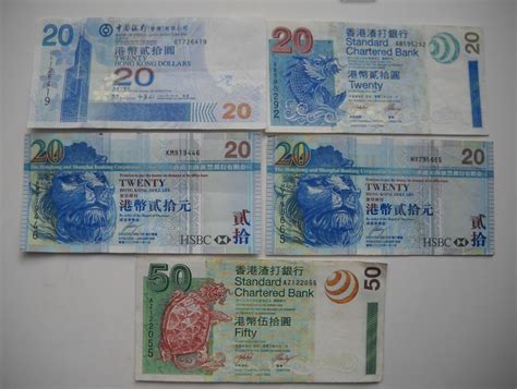 香港公布新钞 三大银行首次统一钞票面额背面主题_手机新浪网