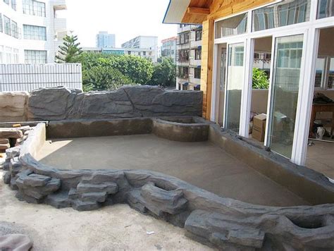 水泥制作鱼池,水泥鱼池的建造图,水泥加玻璃鱼池图_大山谷图库