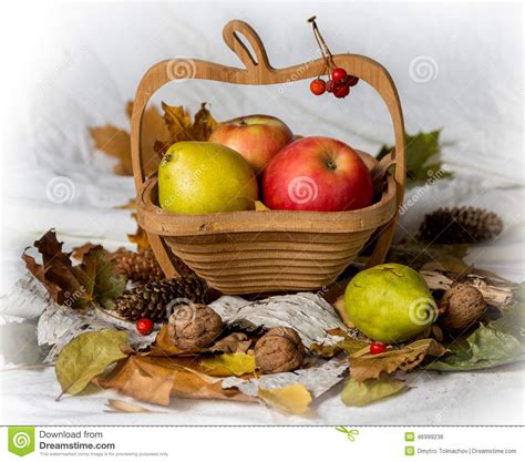 Apples in a Basket and Walnuts Stock Photo - Image of basket, apple ...
