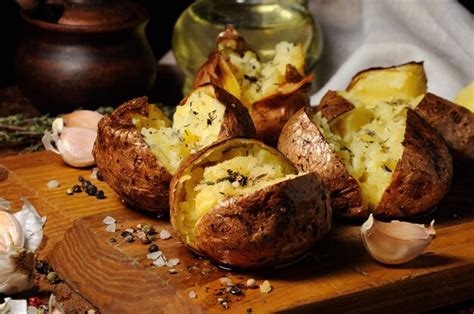 Premium Photo | Baked potato with spices and herbs