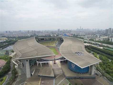 【重庆日报】西南地区最大高校体育场馆竣工 形似“学位帽” - 媒体重大 - 重庆大学新闻网