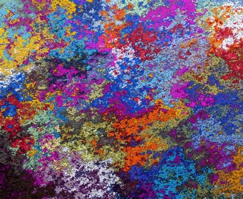 五颜六色的染料一起拼接形成一幅超现代主义抽象作品背景花纹素材设计