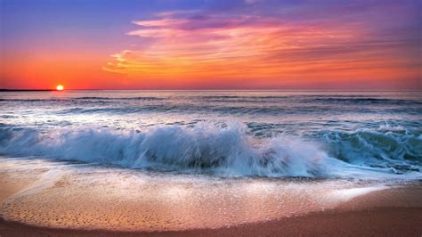 海边日落日出的景观图片-布雷拉亚得里亚海沿岸的迷人日落素材-高清图片-摄影照片-寻图免费打包下载