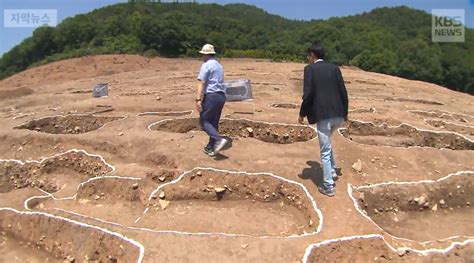 韩国修路时发现千年古墓群 出土1万件文物(图)_手机新浪网
