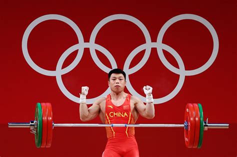 谌利军获东京奥运会举重男子67公斤级冠军_文体汇_新民网