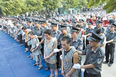 袭击民警致死 广州26名聚众闹事的嫌犯被逮捕(图)