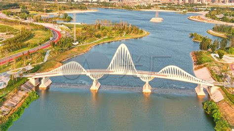 浉河二号桥工程施工正酣，建成后集交通效能与景观效果于一体_新浪新闻