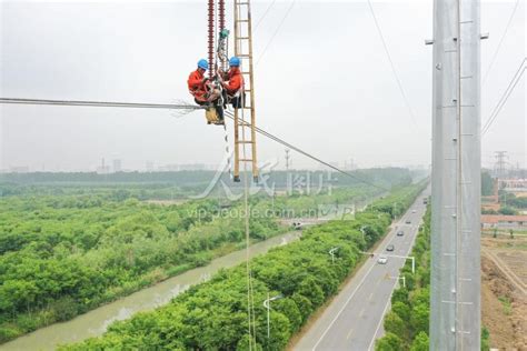 江苏金湖：线路迁改让位项目建设-人民图片网