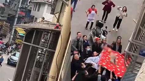 四川2岁幼童爬出阳台坠落 众人合力拉开床单、棉被稳稳接住_腾讯视频