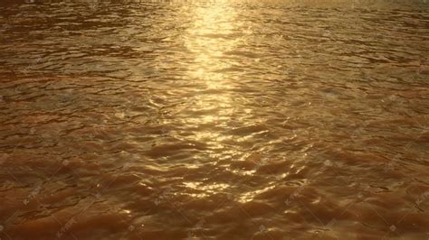 夕阳下金光灿灿的江水河水意境高清摄影大图-千库网