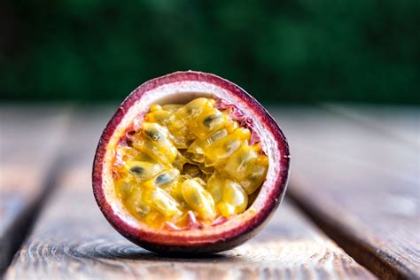 Fresh passion fruit on wood table in top view flat lay for background ...
