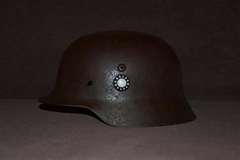 二战经典德式M35钢盔 金属打造影视道具收藏头盔 可装配金属徽章-阿里巴巴