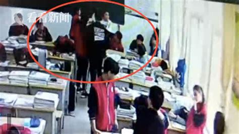 濮阳一男生教室内遭同班女生殴打 打人者面带笑容竖大拇指_大豫网_腾讯网