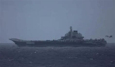日本派“御用摄影师”跟拍中国舰艇？国防部正告！__财经头条