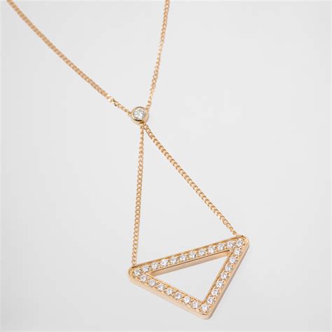 『珠宝』Prada 推出 Eternal Gold 新作：三角徽标，宝石与爱心 | iDaily Jewelry · 每日珠宝杂志