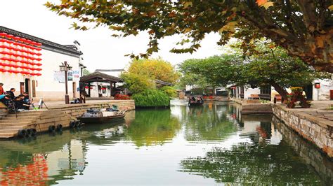 去浙江杭州西溪湿地和西塘古镇,两个地方离的远吗,怎么坐车方便