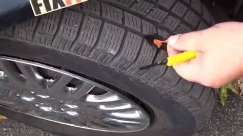 汽车轮胎被钉子扎了，临时应该怎么处理？
